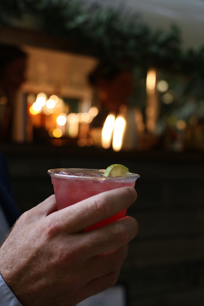 holding a glass of beverage - Bisoux De Lune