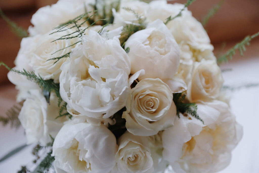 white roses mixed with peonies in the bridal bouquet -bisoux de lune meagan reily