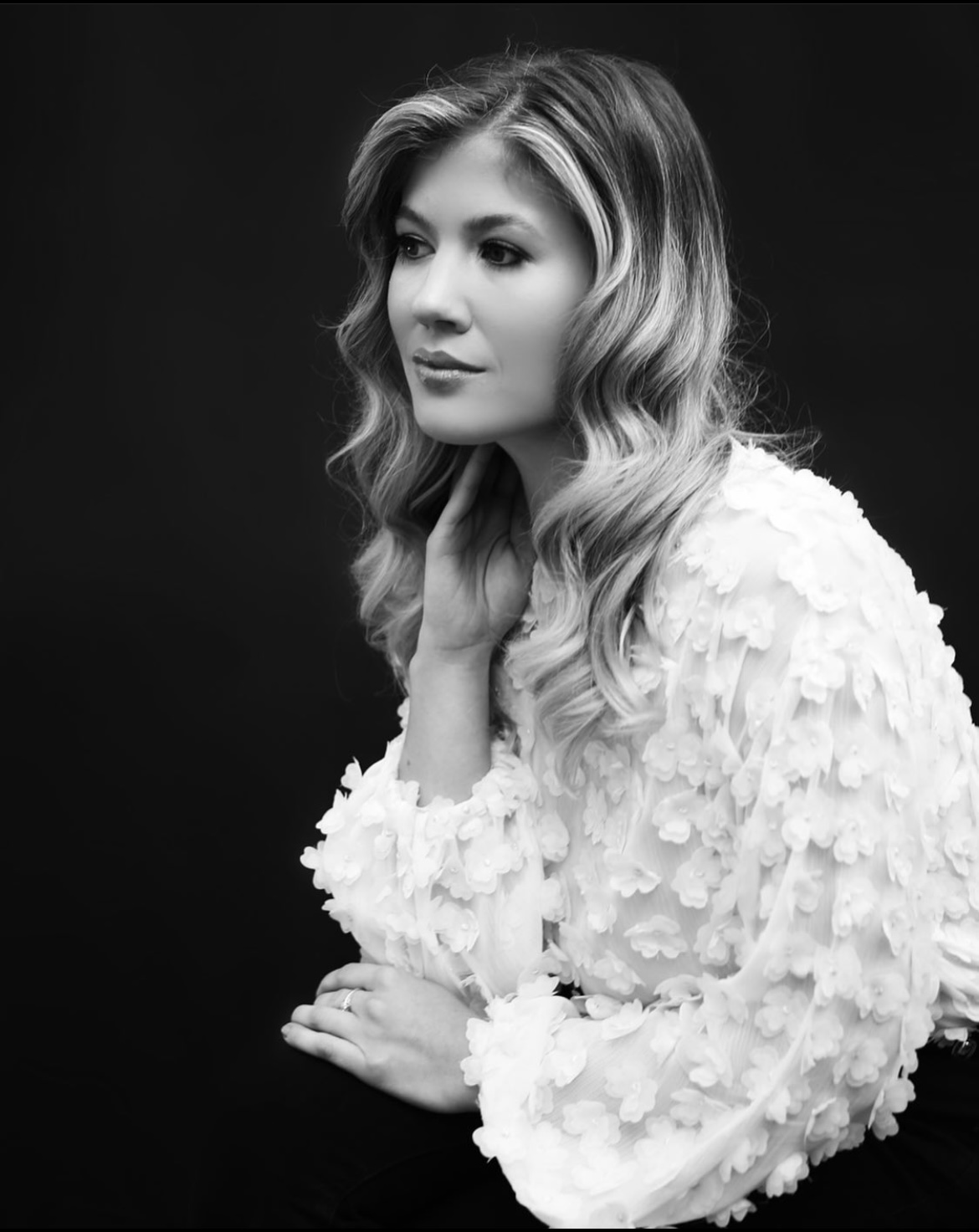 high contrast portrait of a blonde woman looking pensive in a textured white blouse - bisoux de lune meagan reily