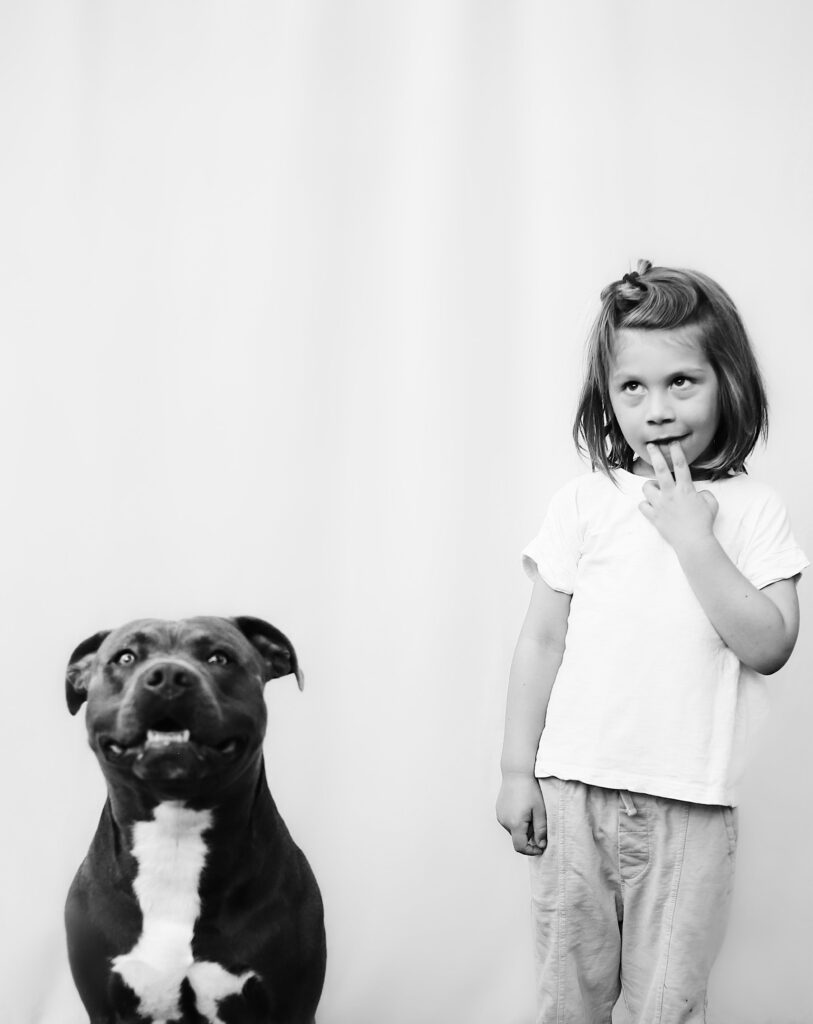 pitbull and girl in white shirt - Bisoux De Lune