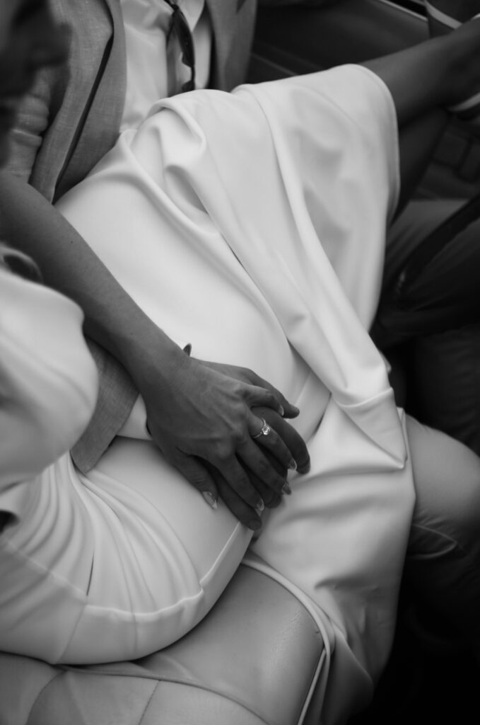 womans hand wedding ring, hand rested on thigh - Bisoux De Lune - Meagan Reily photography